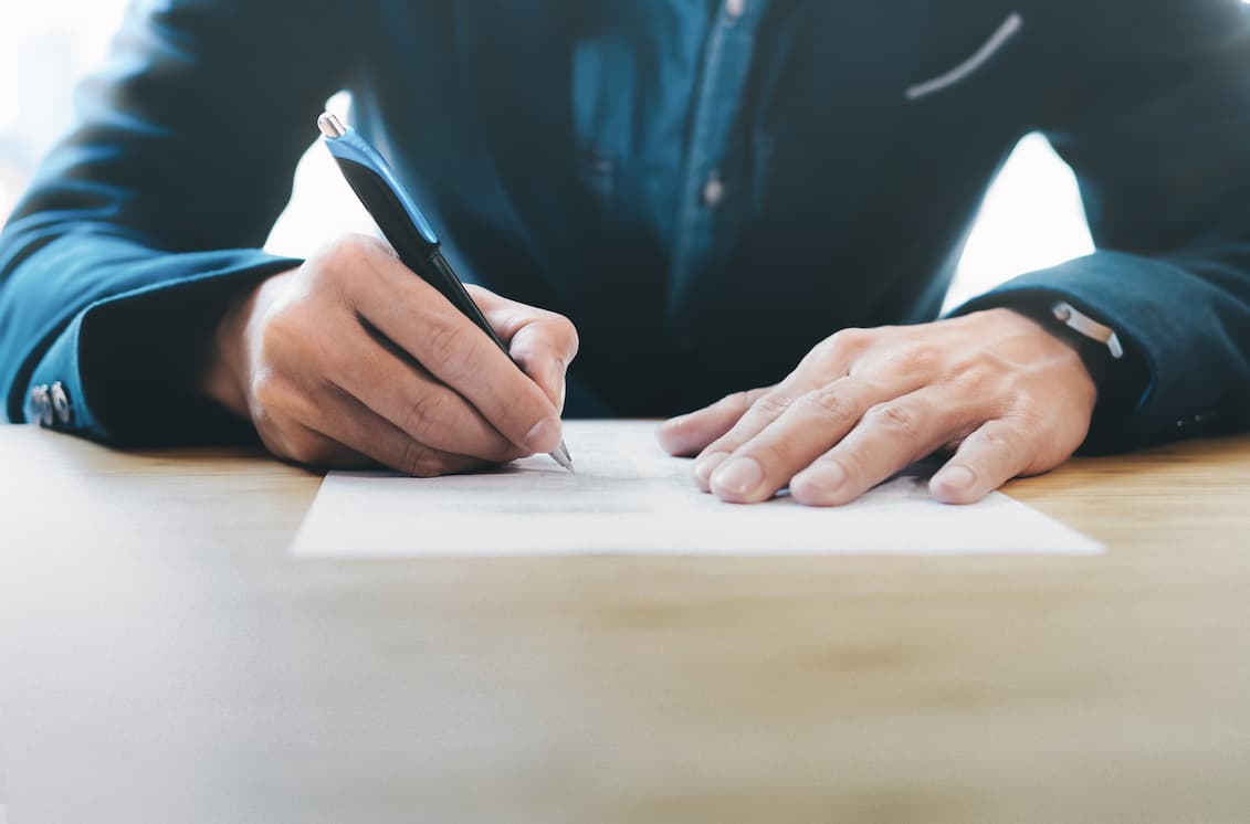 a man writing an appraisal